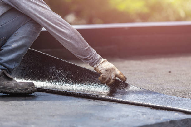 Professional Waterproofing technician working in Carrollton, MI
